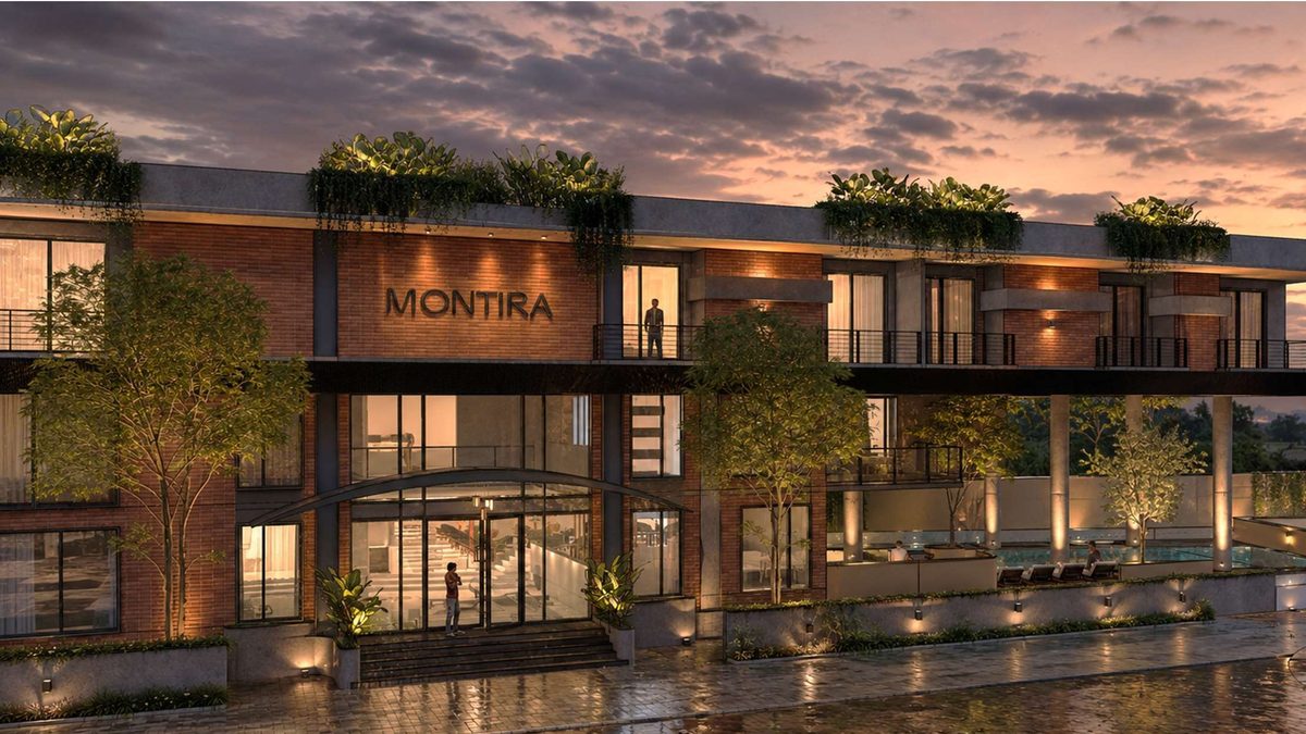 The proposed Montira clubhouse at dusk, an architect's render